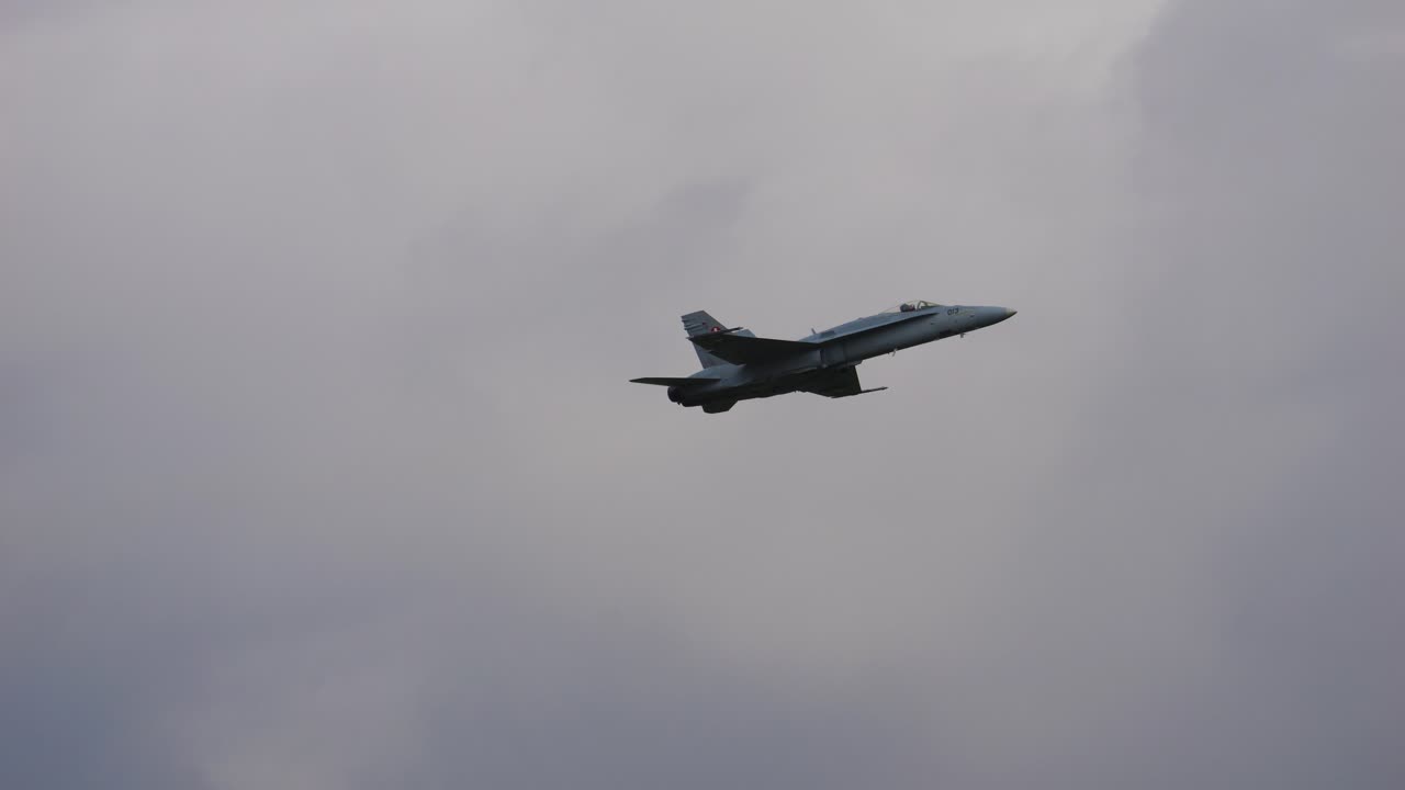 FA 18 fighter plane flies through the sky at slow speed in slow motion. Airpower 2024