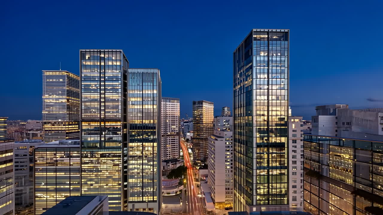 Modern Cityscape at Night with Illuminated Skyscrapers and Light Trails