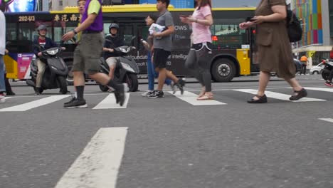 legs of pedestrians crossing road taiwan 01