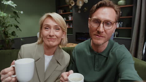 couple enjoying coffee and conversation in a cozy cafe