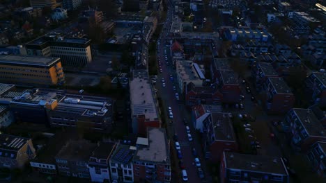 arnhem by night dutch top down city drone twilight shot with tilt up