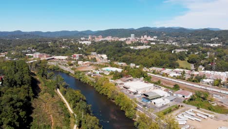 4K-Aerial-Drone-Video-of-West-Asheville,-NC-along-the-French-Broad-River