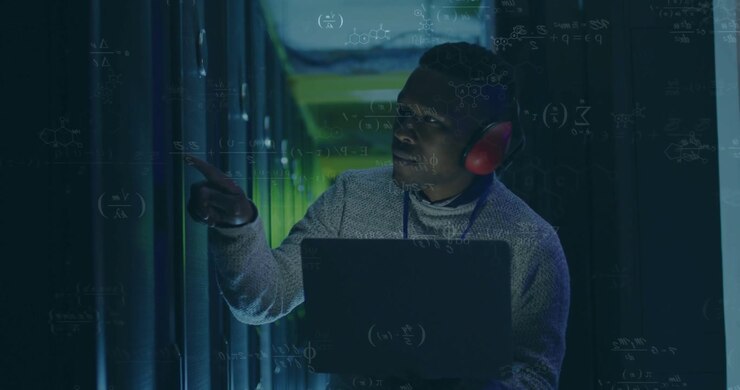 Datacenter technician checking laptop, pointing rack, locating faulty bay, diagnostics overlaying
