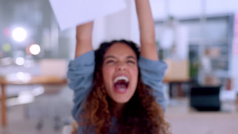 happy woman throw papers in office success