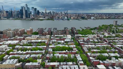 midtown manhattan skyline as seen from homes in residential neighborhood, hoboken new jersey