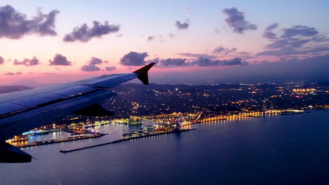 Enjoying aerial views of Barcelona area while approaching and landing in Barcelona Airport