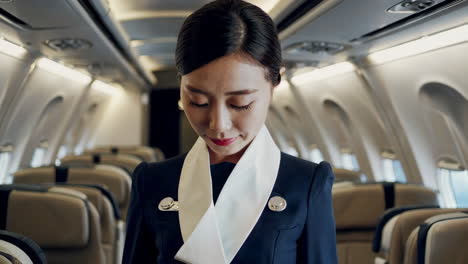 flight attendant in airplane cabin