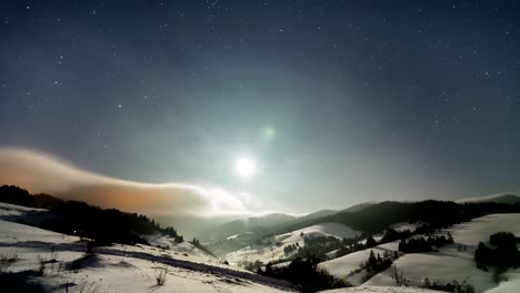 winter night sky with stars and moon light time lapse