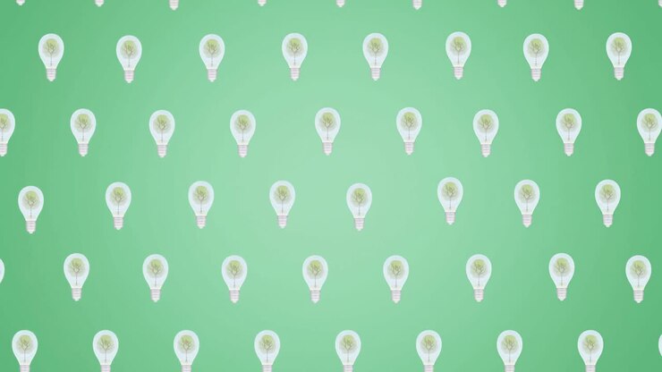 Animation of multiple falling light bulbs with trees inside on green background