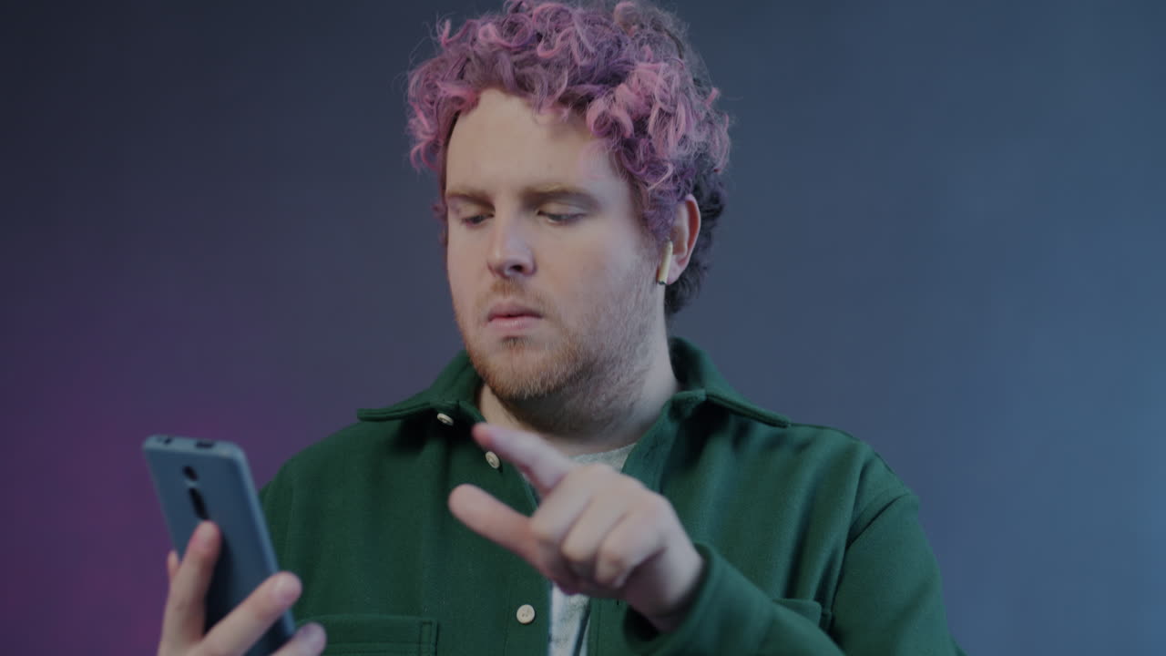 Man Listening to Music and Talking on Phone