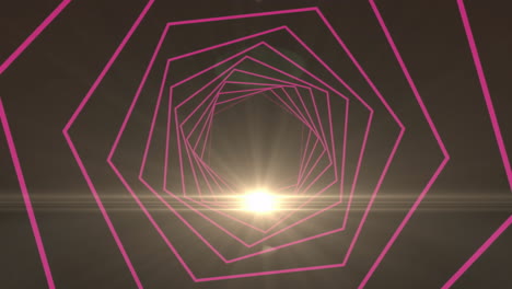 animation of bright light flare through pink geometric tunnel pattern