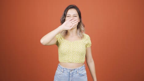 sleepy young woman yawns.