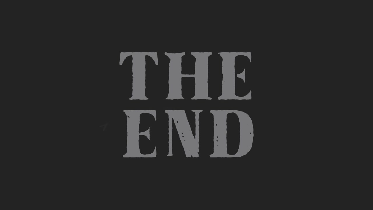 Animazione testuale cinematografica 'The End' con sovrapposizione grunge
