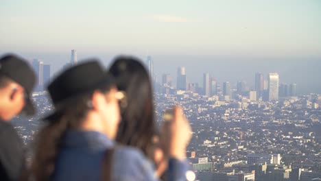 tourists photographing la skyline