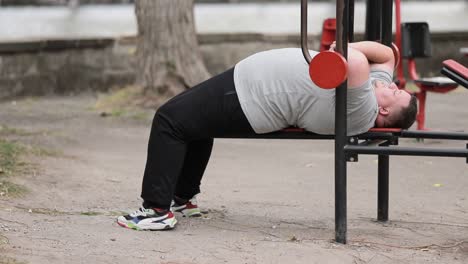 big fat man resting while doing sports lazy people the problem of obesity big fat man resting while doing sports lazy people the problem of obesity