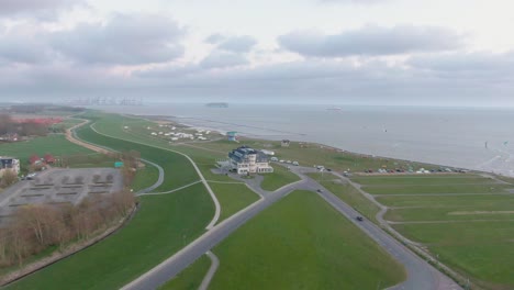 aerial drone shot of house at dike with