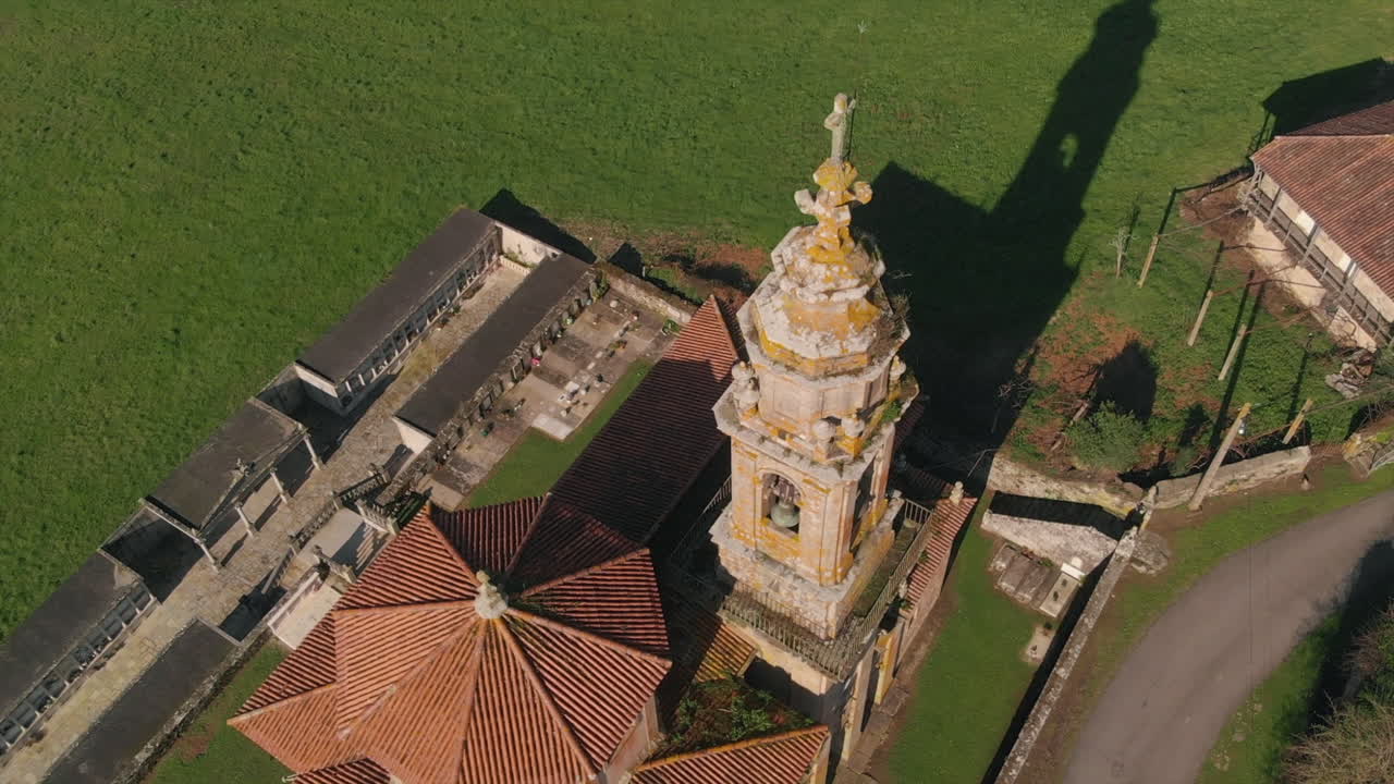 Aerial View Of The Ancient Parish Church Of Nosa Señora dos Desamparados In Abades, Spain - descending drone shot