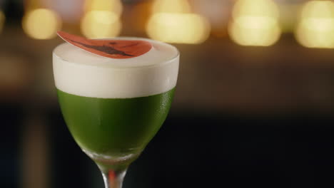 creative matcha cocktail with edible decoration