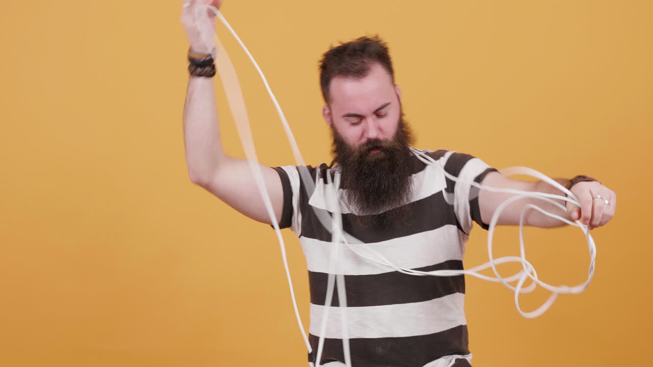 Man Tangles White Wires