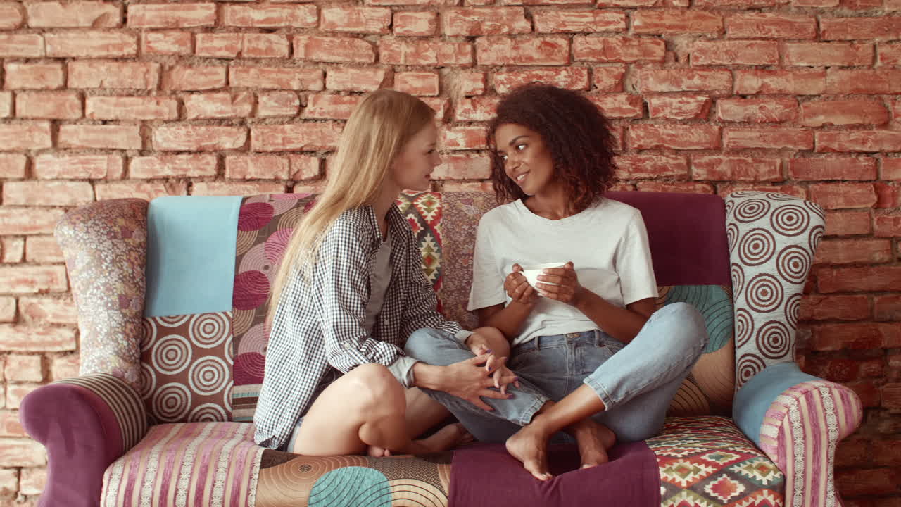 Modern couple resting together at home.