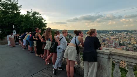 visitors admire panoramic cityscape from lookout point