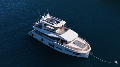 slow motion drone shot of beautiful luxury yacht at sea in slow motion