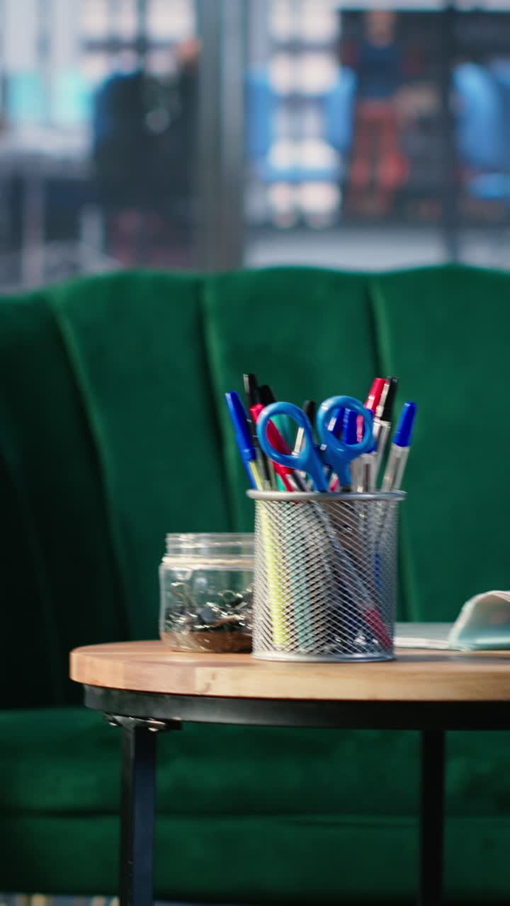 Vertical Video Business lobby featuring sofa in a bright modern boardroom with glass elements