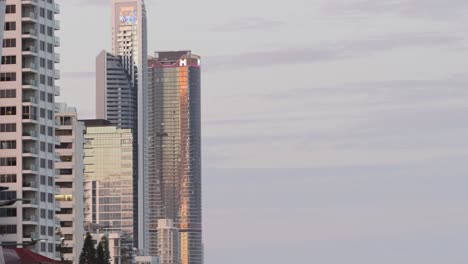 skyscrapers reflecting sunset light in urban skyline