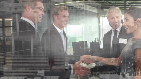 Animation-of-businessman-handshake-over-cityscape