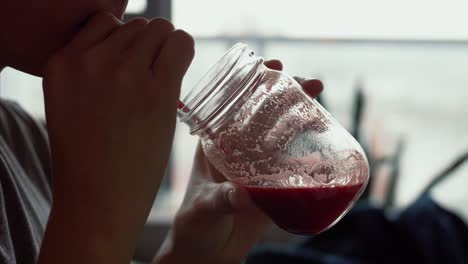 juicing with glass, morning breakfast, healthy diet, cold press celery, beets, apple, lemon