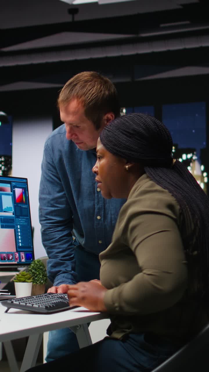 Vertical Video Multiethnic editors team using AI machine learning for editing content