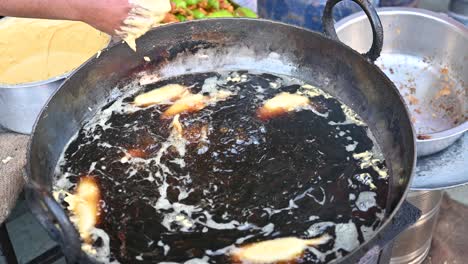 indian street food, fried spicy chilli pakora, the famous food in jodhpur city in rajasthan, india