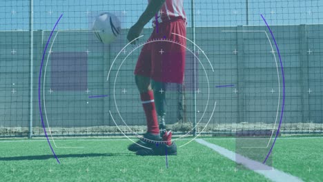 잔디 잔디에서 축구를 연습하는 의수 다리를 가진 남성 축구 선수에 대한 범위 스캐너
