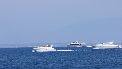 multiple boats cruising on the sea