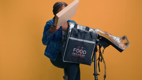 woman delivers food with courier bag