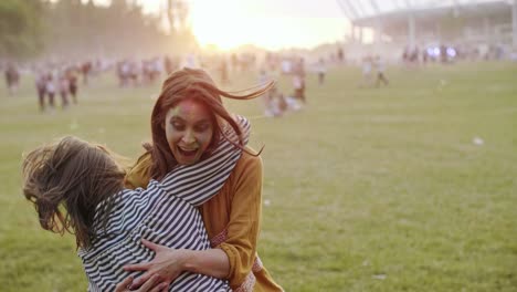 Playful-women-having-fun-during-the-summer-festival