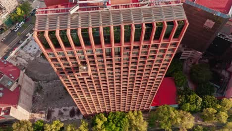 aerial birds eye view of side of building at day in mexico city near reforma cityscape