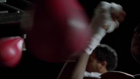 A-couple-of-boxers-work-out-on-speed-bags