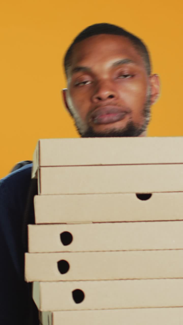 Young Man Courier with Pizza Boxes and Delivery Backpack