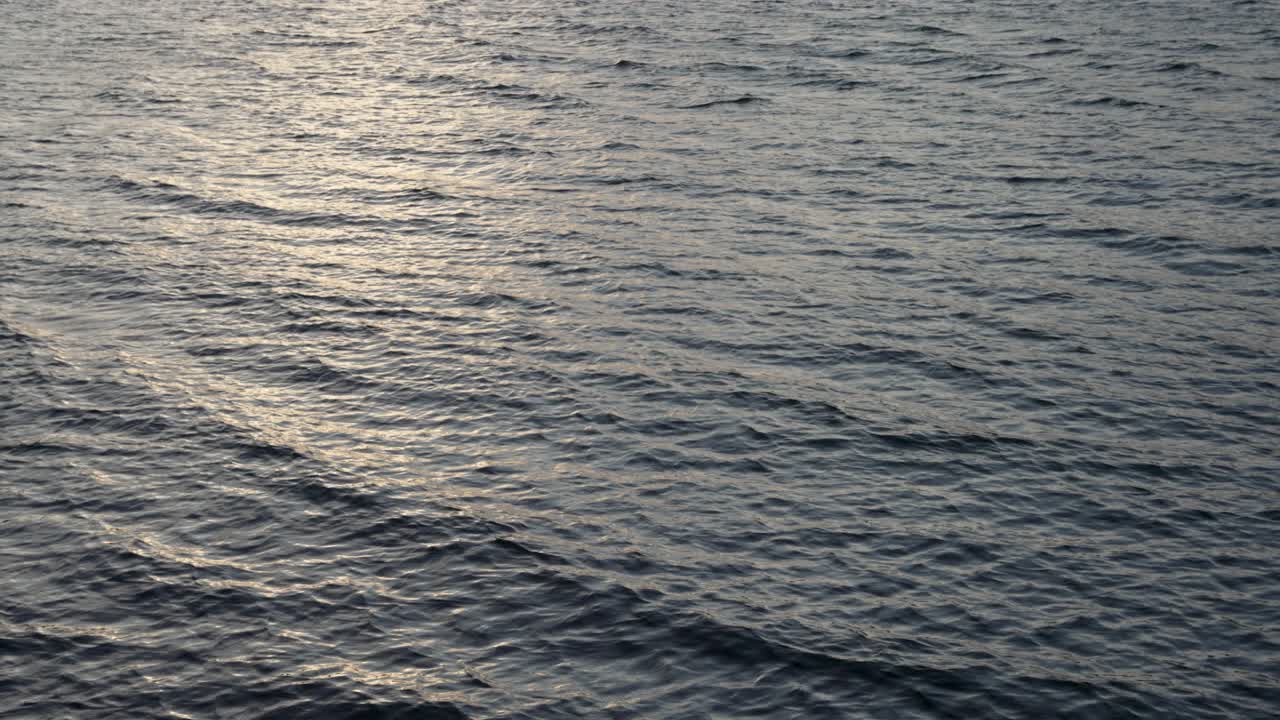 Calm Waves Calmly Breaking With During Sunset Golden Hour Light