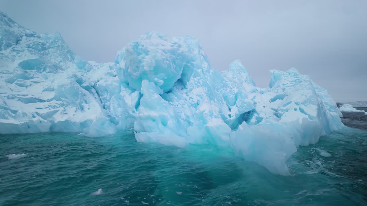 Melting icebergs in coastal southeastern Greenland evoke tranquility and awe