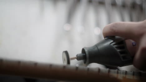 handheld grinder repairing bicycle parts
