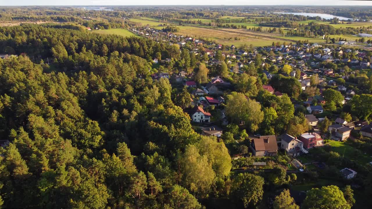 Aerial View of a Village Surrounded by Forest