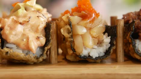 assortment of fried sushi rolls