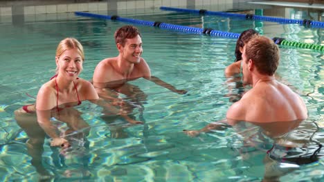 Fit-people-doing-an-aqua-aerobics-class-in-swimming-pool
