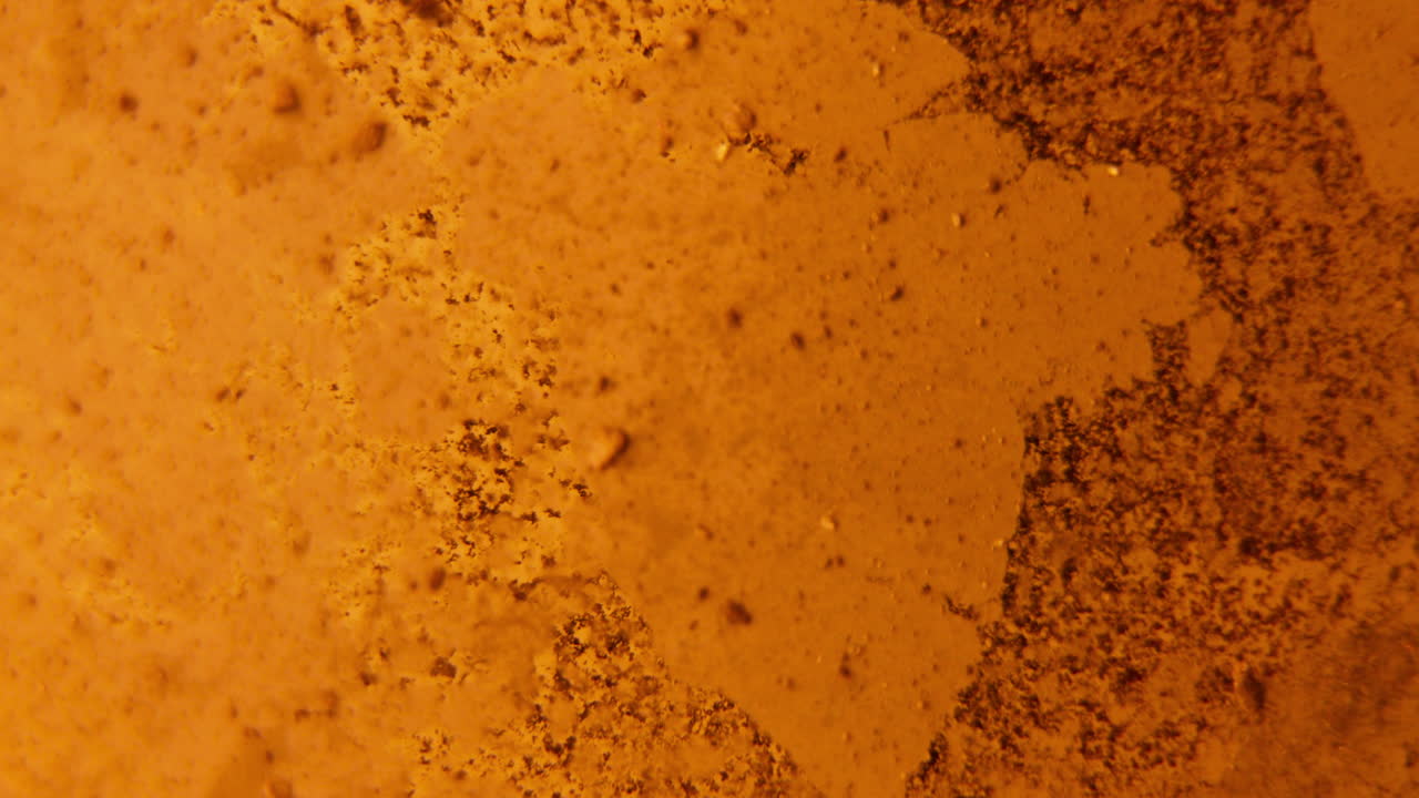 superficie con textura marrón naranja