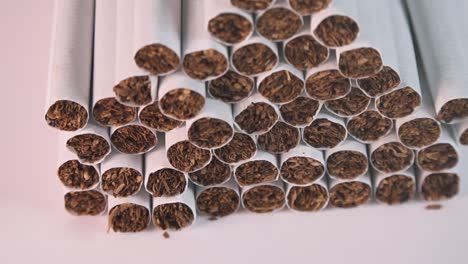 close shot of a pile of cigarettes spinning