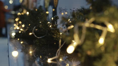 focused close-up of christmas lights on a street decoration