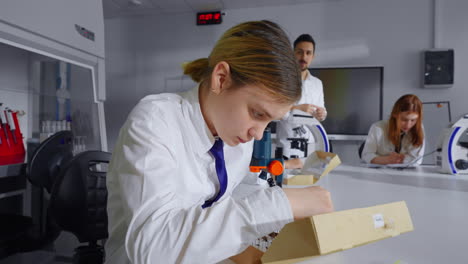 students working in a science laboratory.