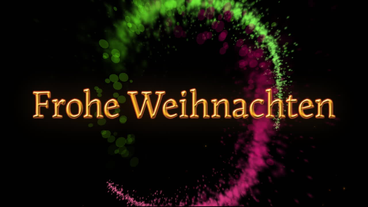 Animation des Textes „Frohe Weihnachten“ über leuchtenden Lichtern auf schwarzem Hintergrund